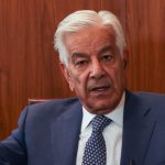 Pakistan's Defence Minister Khawaja Muhammad Asif gestures during an interview with Reuters in Islamabad